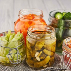 fermented vegetables in jars on counter