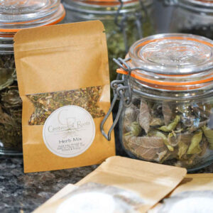 CR Special Herb Mix in package with glass herb jars in background sitting on counter.