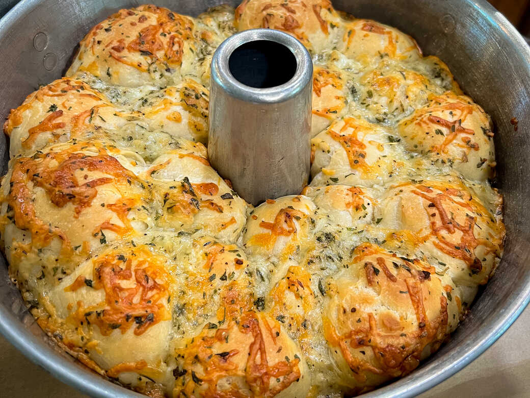 Garlic cheesy monkey bread in bundt pan.
